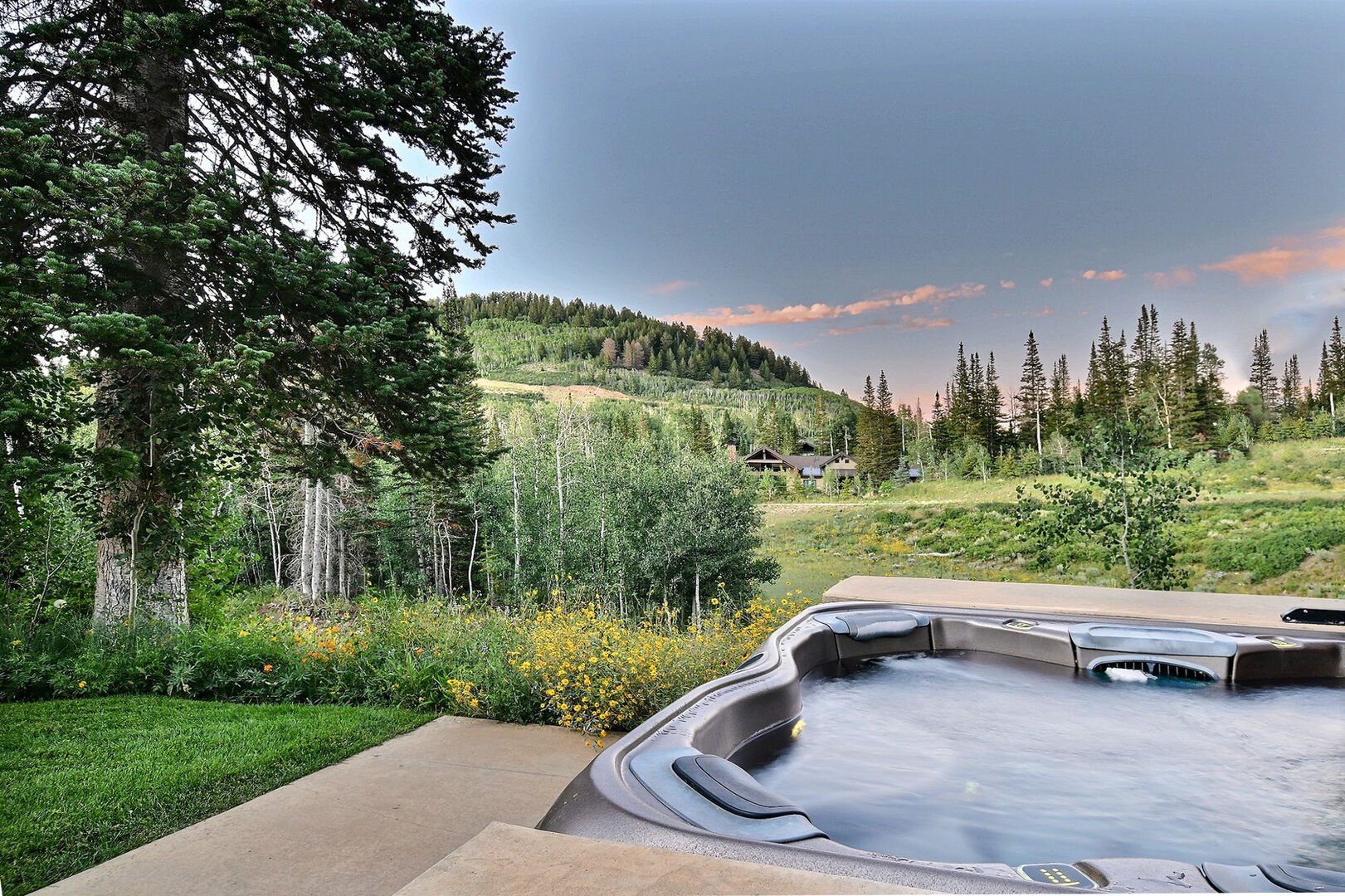 One of our forest view rental houses in Park City with a hot tub.